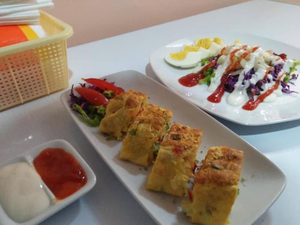 Фото Omah Madam Bed & Breakfast