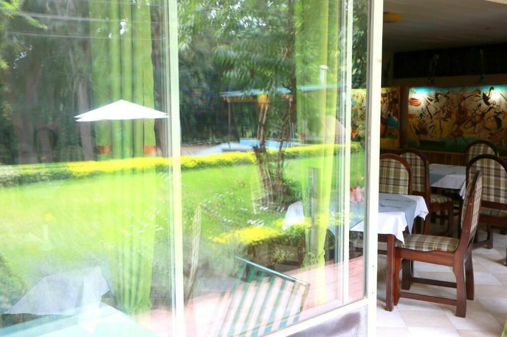 Фото The Equator Hotel