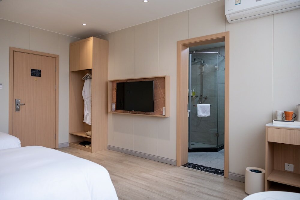 Фото Shanghai Joyful Yard Hotel