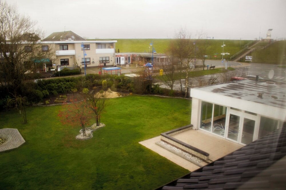 Фото Hotel Am Friesenstrand