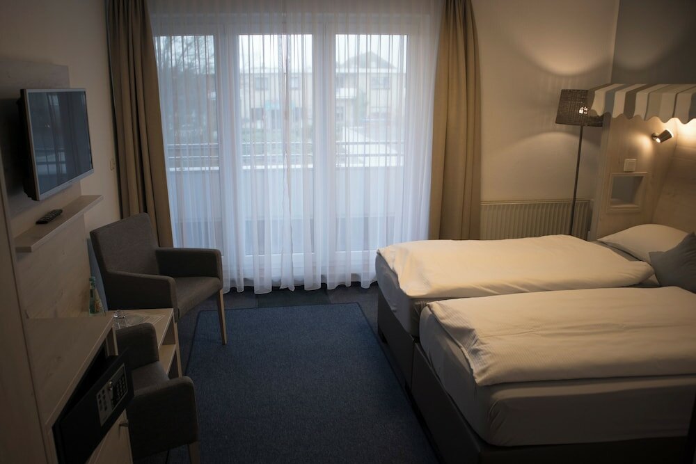 Фото Hotel Am Friesenstrand