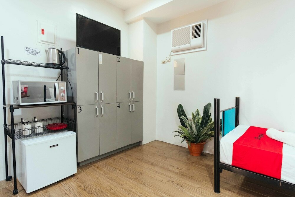 Фото Oyo 443 Maria Cristina Arcade Suites