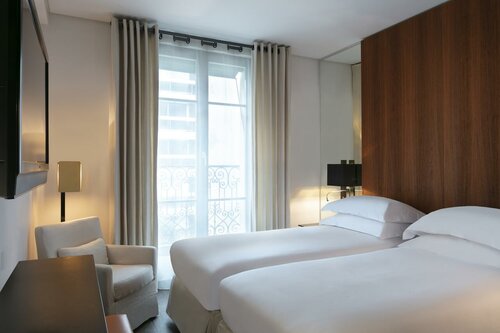 Гостиница Le Metropolitan, Paris Tour Eiffel, a Tribute Portfolio Hotel в Париже