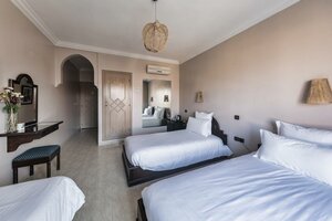 Гостиница Amani Hotel Suites & SPA