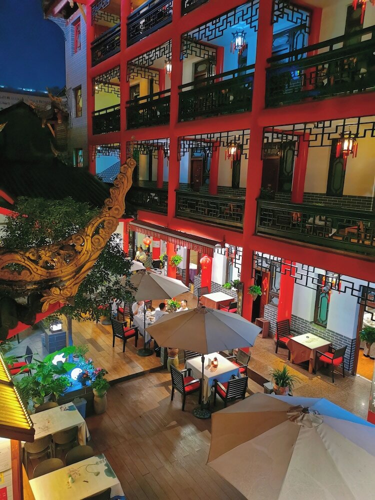 Фото Chengdu Wenjun courtyard Hotel