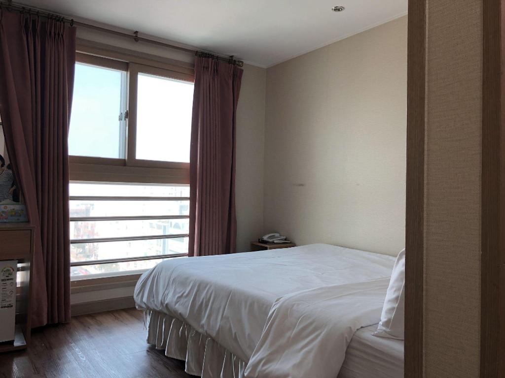 Фото Jeju Skyhill Business Hotel