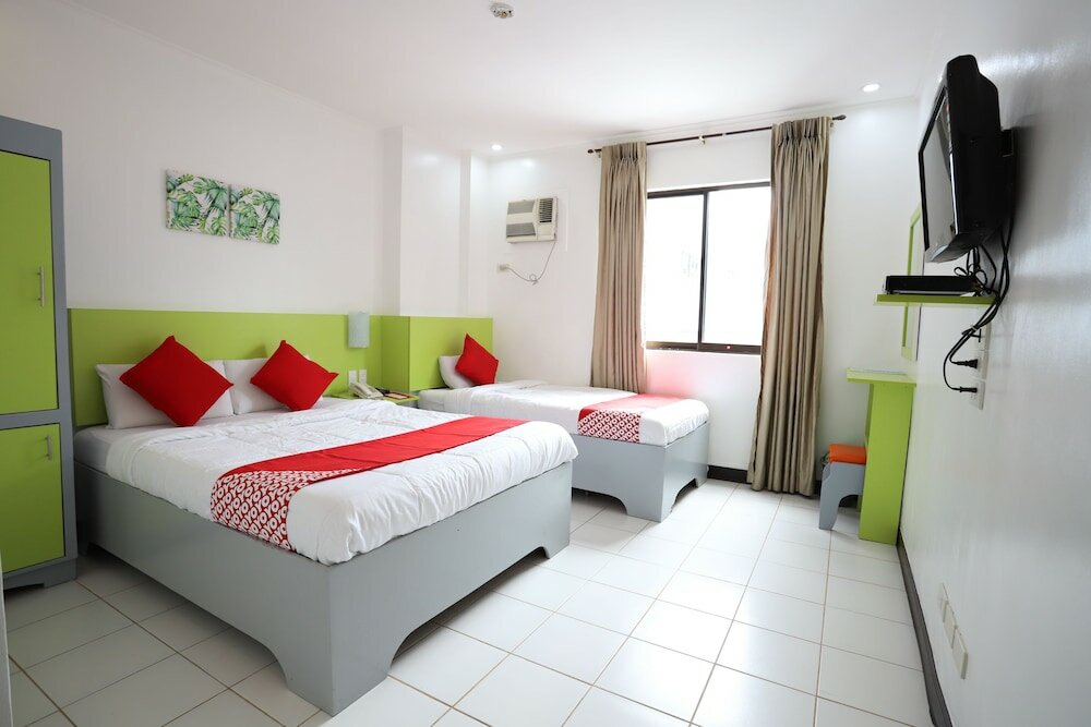 Фото Oyo 210 Apple Tree Suites