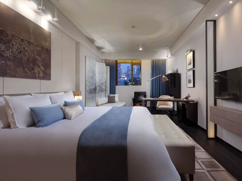 Фото Golden Tulip Bund New Asia