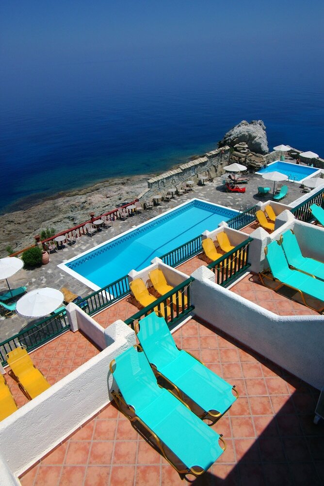 Фото Cavos Bay Hotel and Studios