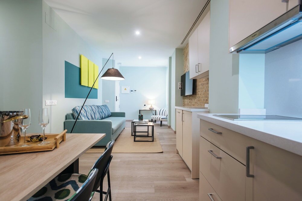 Фото Sercotel Sevilla Guadalquivir Suites