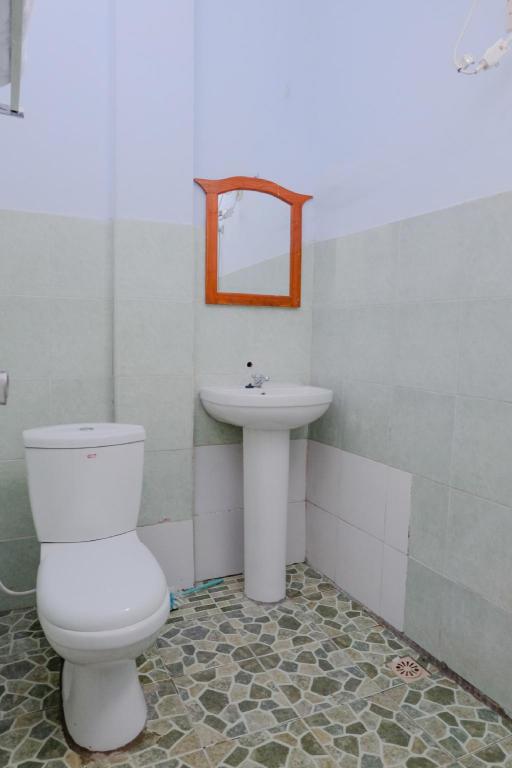 Фото Oyo 314 Emas 23 Guest House Syariah