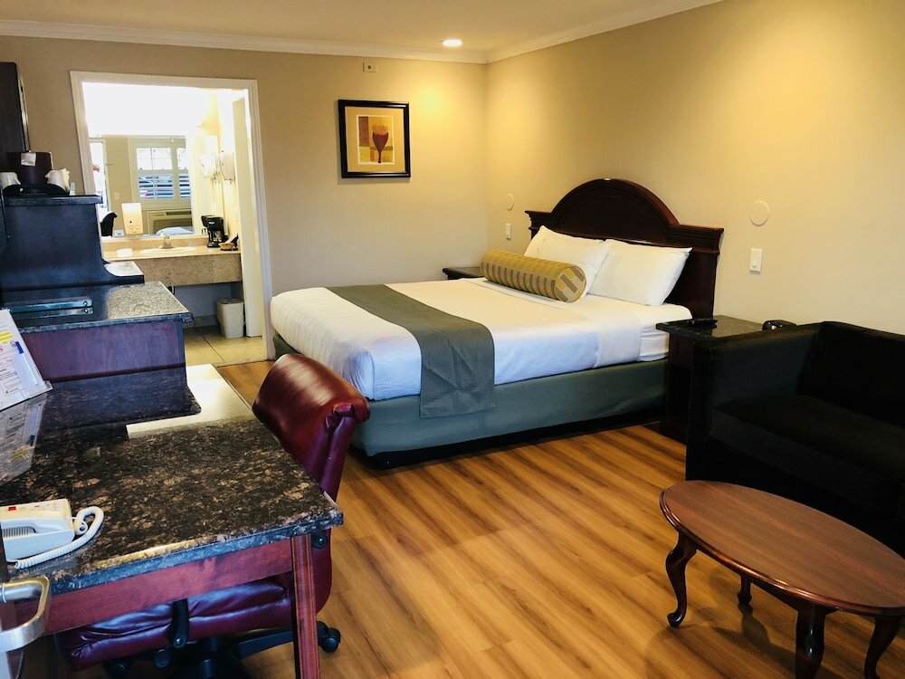 Фото Dynasty Suites Hotel Riverside