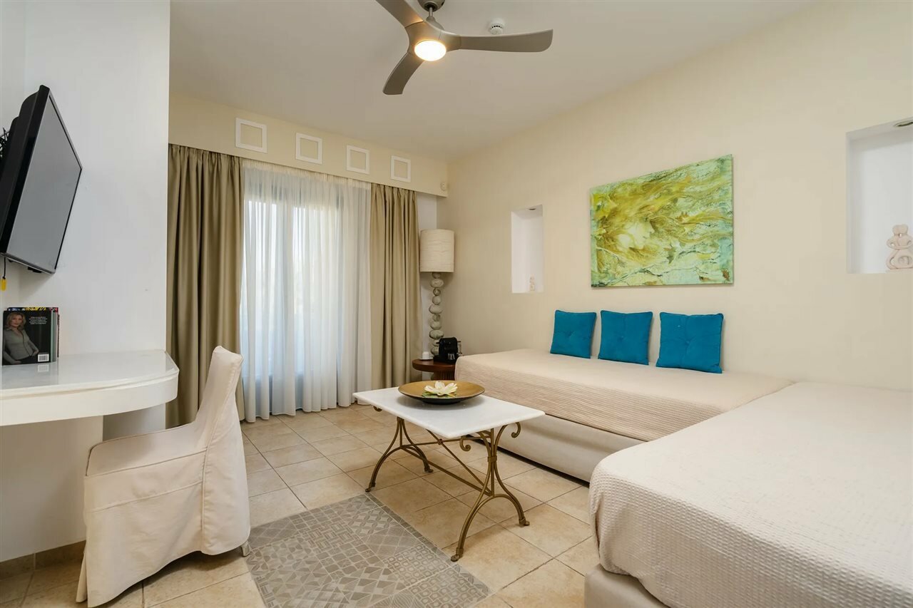 Фото Mitos Suites