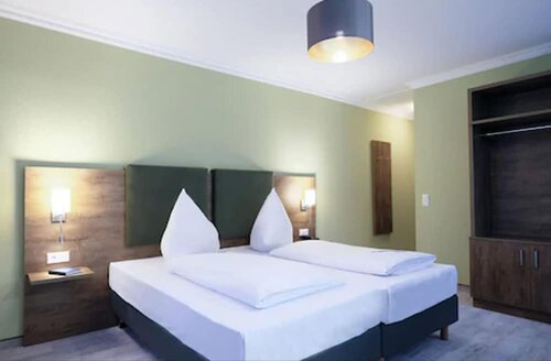 Гостиница Hotel R& xF6; merstadt в Герстхофене