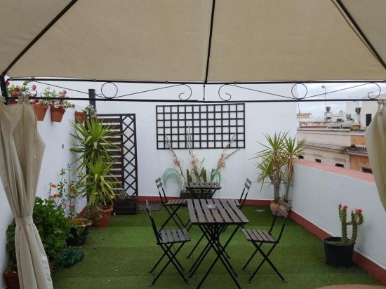 Фото Hotel y Apartamentos Doña Lola