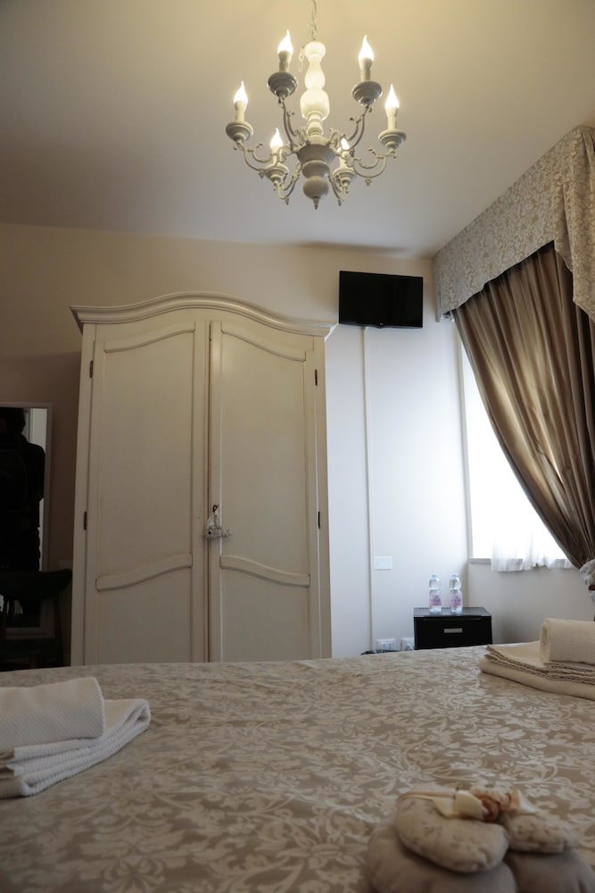 Фото Le Finestre Sul Borgo Rooms
