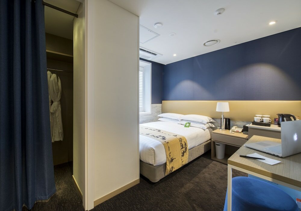 Фото The Grand Hotel Myeongdong