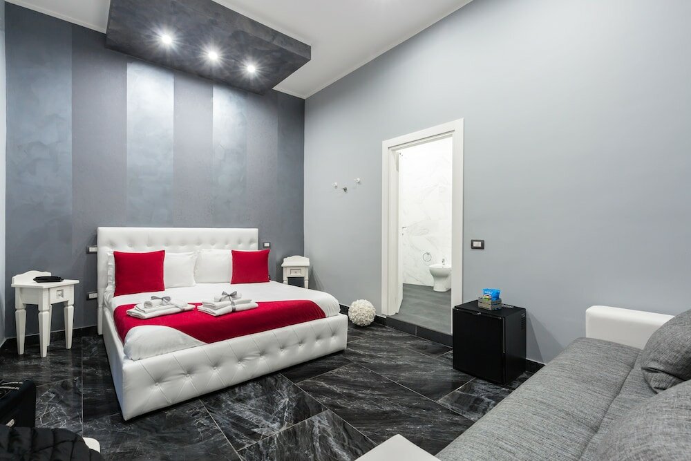 Фото Hotel Bella Napoli Suites