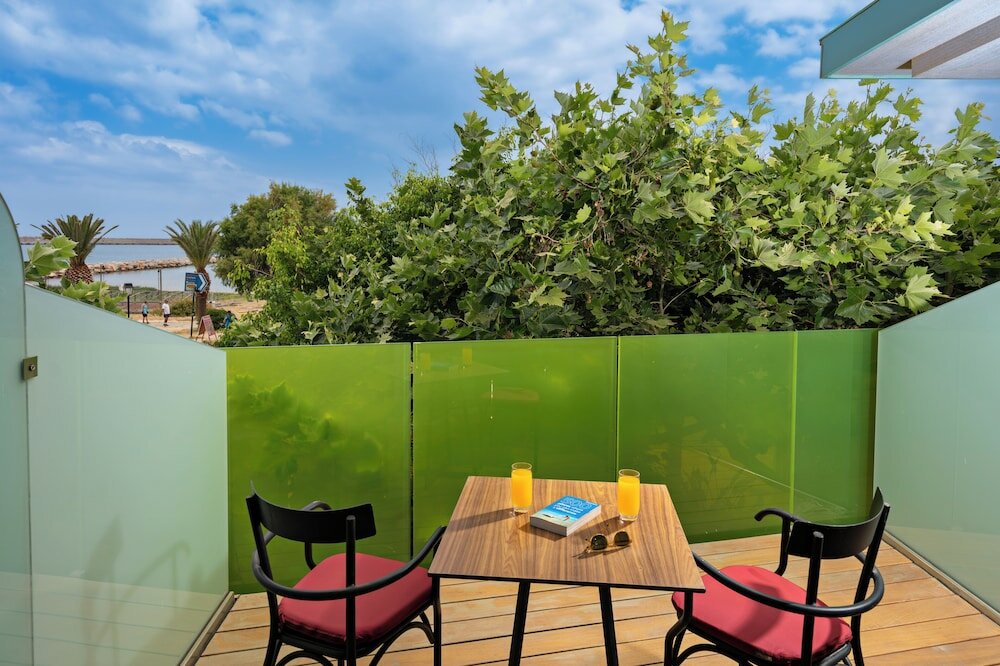 Фото Kyma Suites Beach Hotel