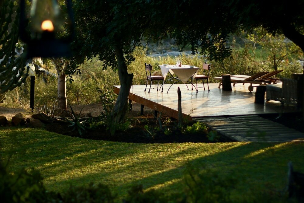 Фото Ivory Wilderness River Rock Lodge