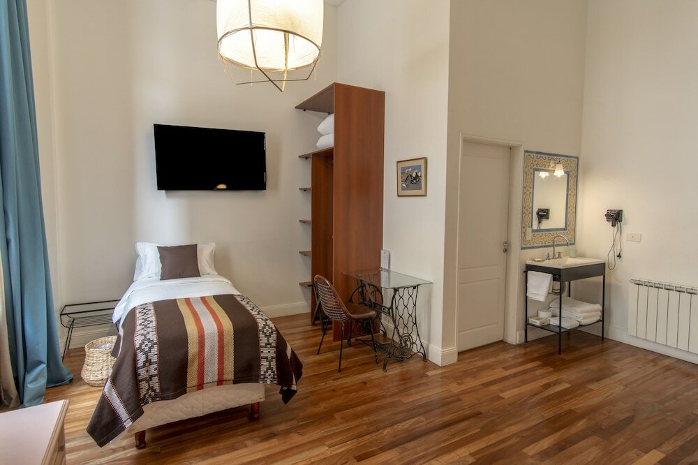 Фото L'Adresse Hotel Boutique