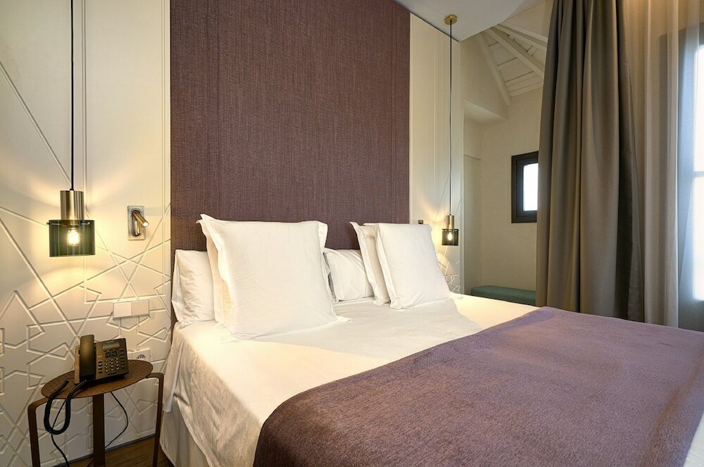 Фото Suites Murillo Plaza Sta Cruz