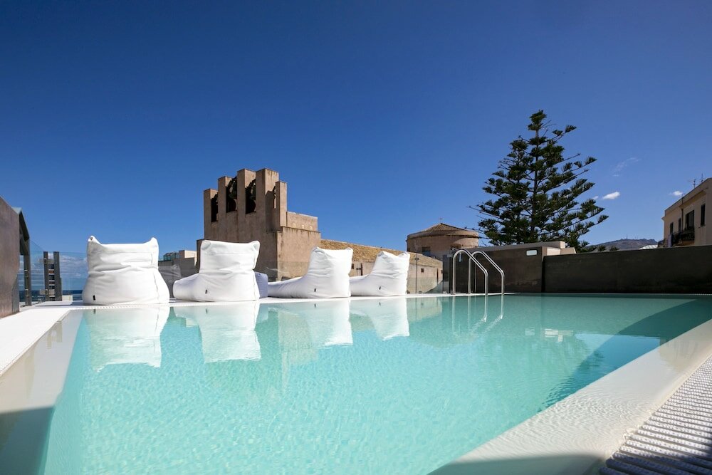 Фото Azzoli Trapani - Apartments & Skypool - Adults Only