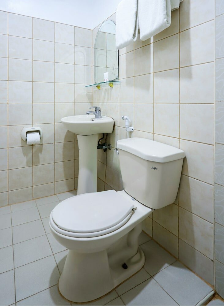 Фото Oyo 210 Apple Tree Suites