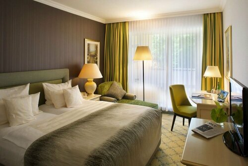 Внешний вид отеля Steigenberger Hotel Der Sonnenhof в Бад-Вёрисхофене, фото 2