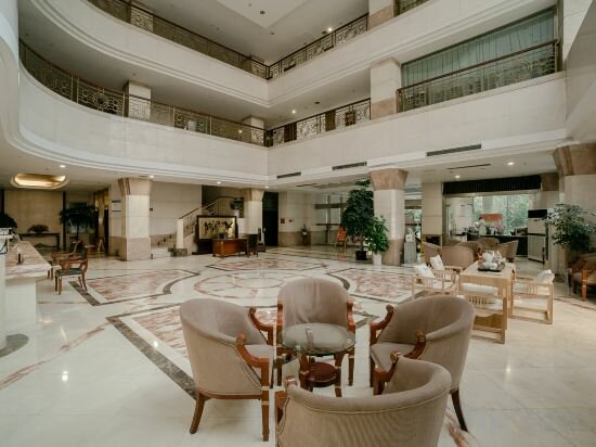 Фото Shi You Yuan Hotel