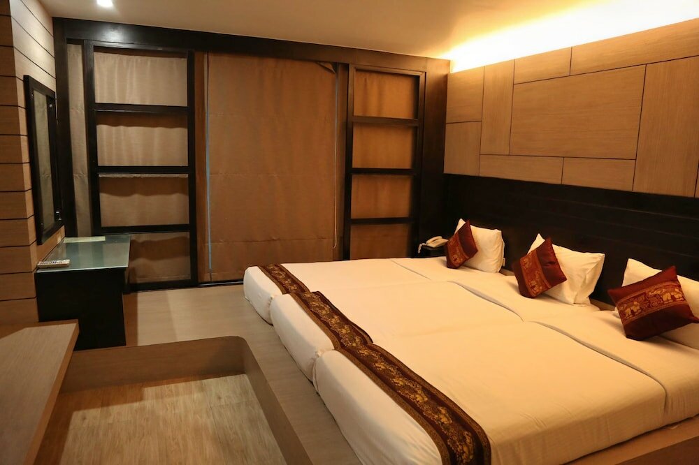 Фото Boss Suites Nana Hotel