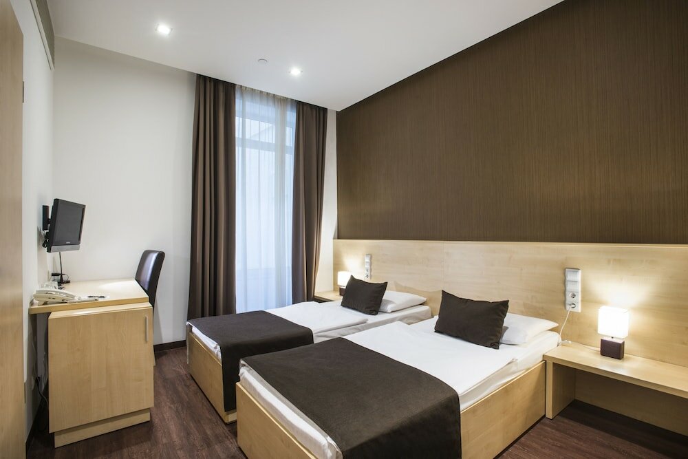 Фото Promenade City Hotel