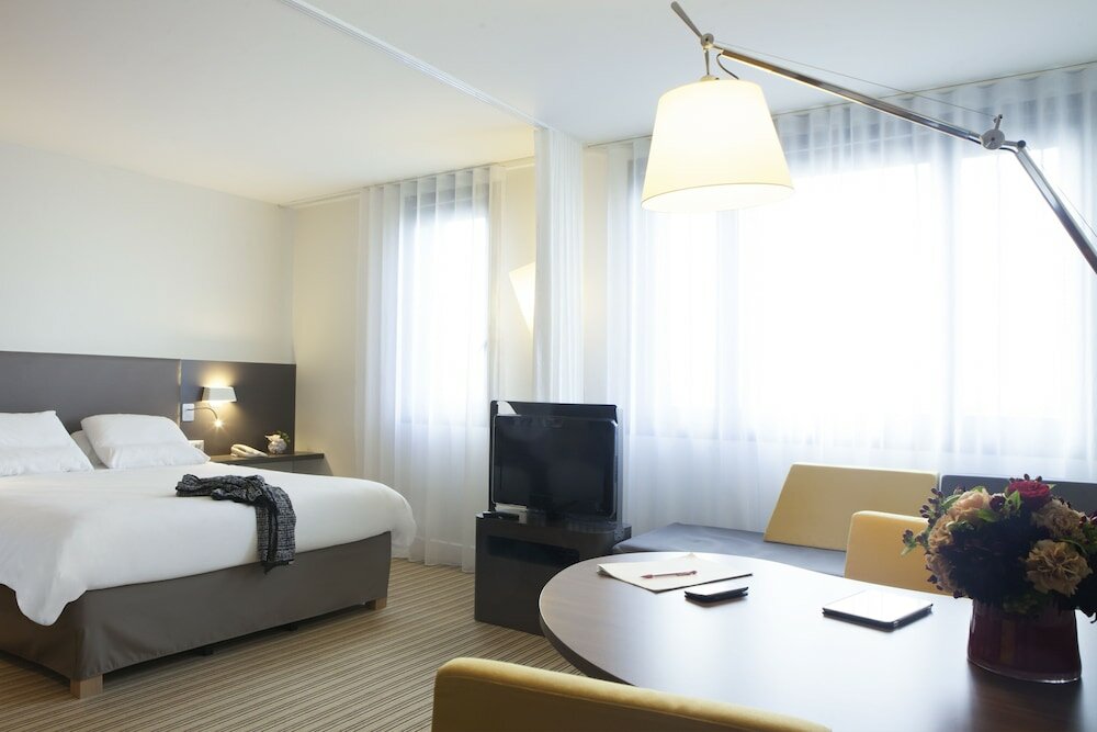 Фото Novotel Suites Paris Nord 18ème Hotel