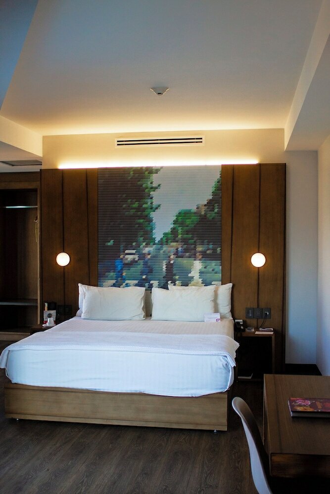 Фото Ikonik Hotel Puebla