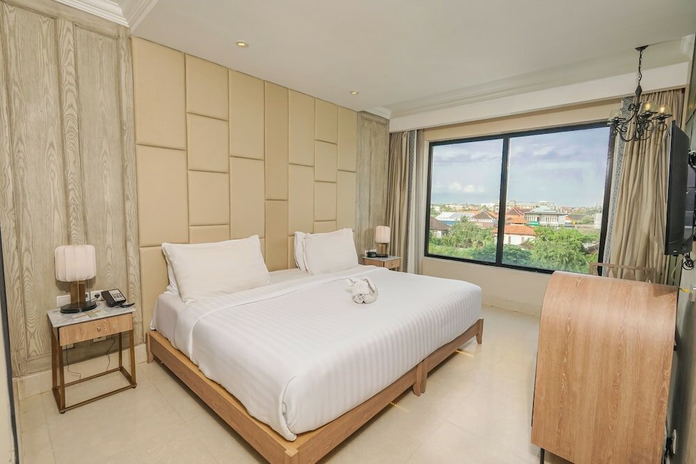 Фото Jambuluwuk Oceano Seminyak Hotel