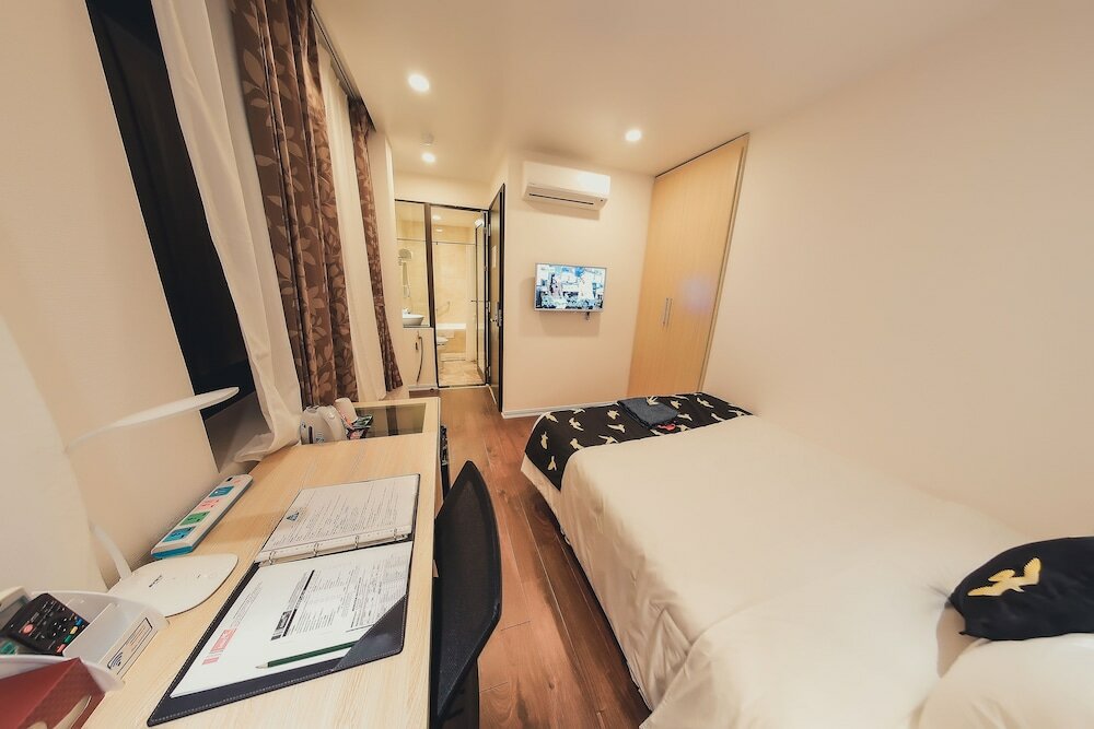 Фото Momizi Business Hotel