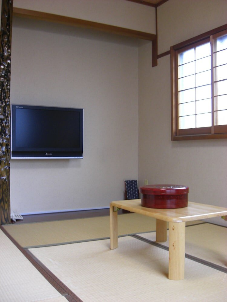 Фото Minshuku Kuwataniya