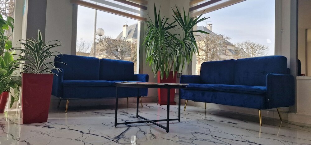 Фото Kyriad Direct Arpajon