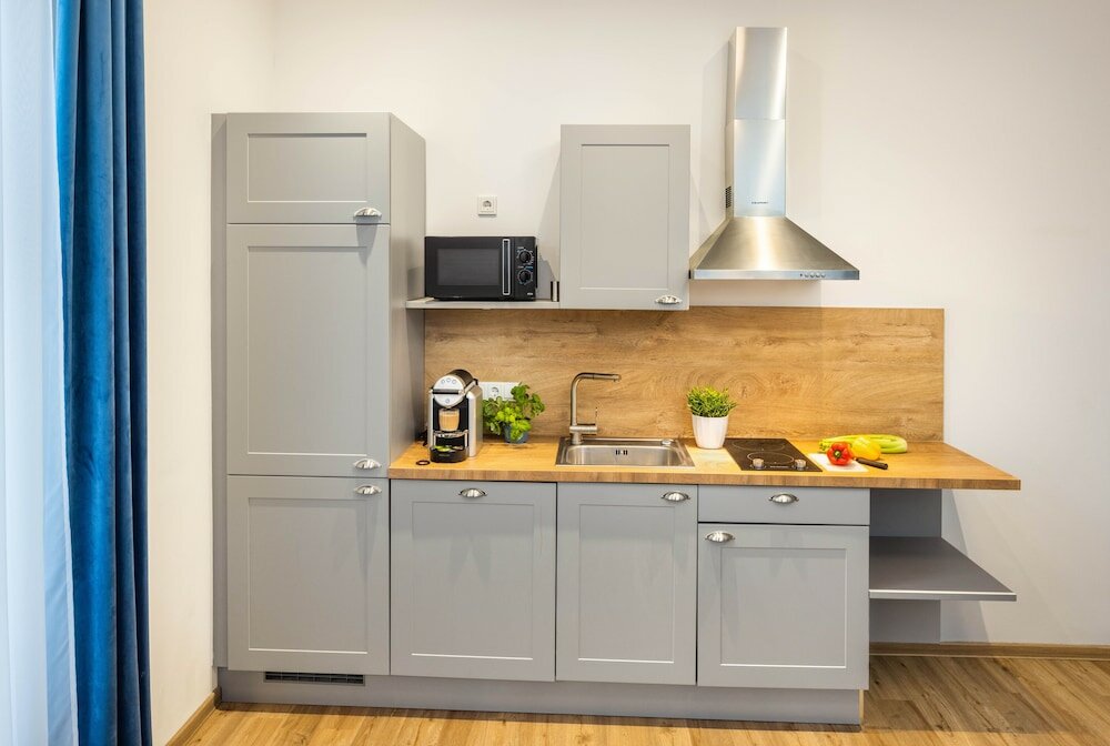 Фото Jimmy's Apartments Emerald