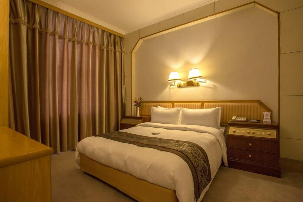 Фото Guangzhou Aiqun Hotel