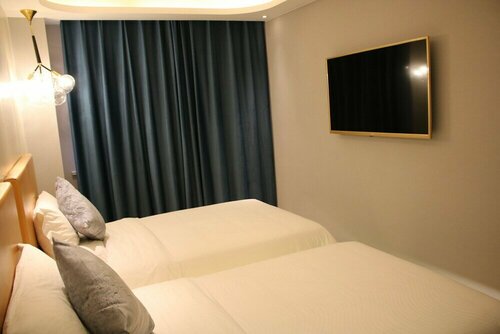 Гостиница R Kiss Boutique Hotel в Цзыбо