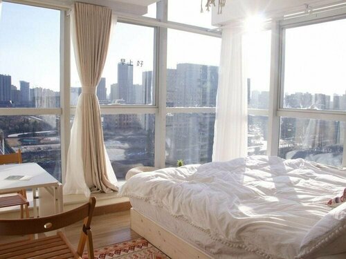 Гостиница July Design Life Homestay Xinzhong Avenue в Синьсяне