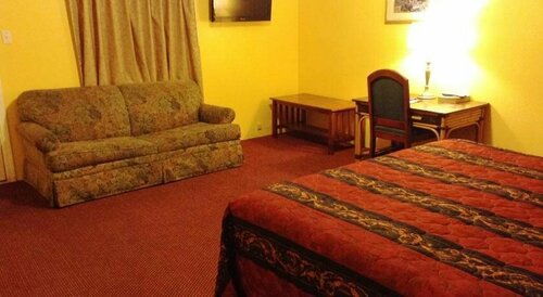 Гостиница Oceanside Inn and Suites в Оушенсайде
