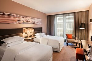 Гостиница Sheraton Düsseldorf Airport Hotel