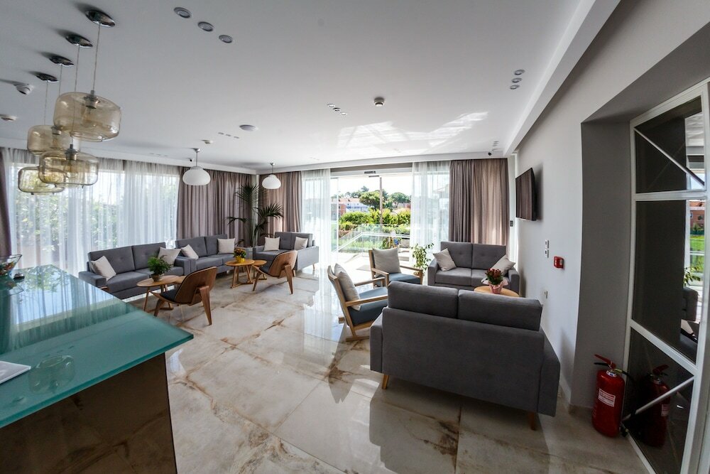 Фото Porto Planos Beach Hotel