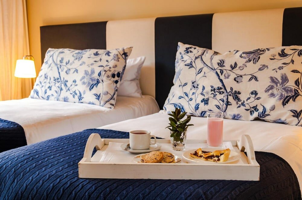 Фото La Escondida Casa de Huespedes & SPA