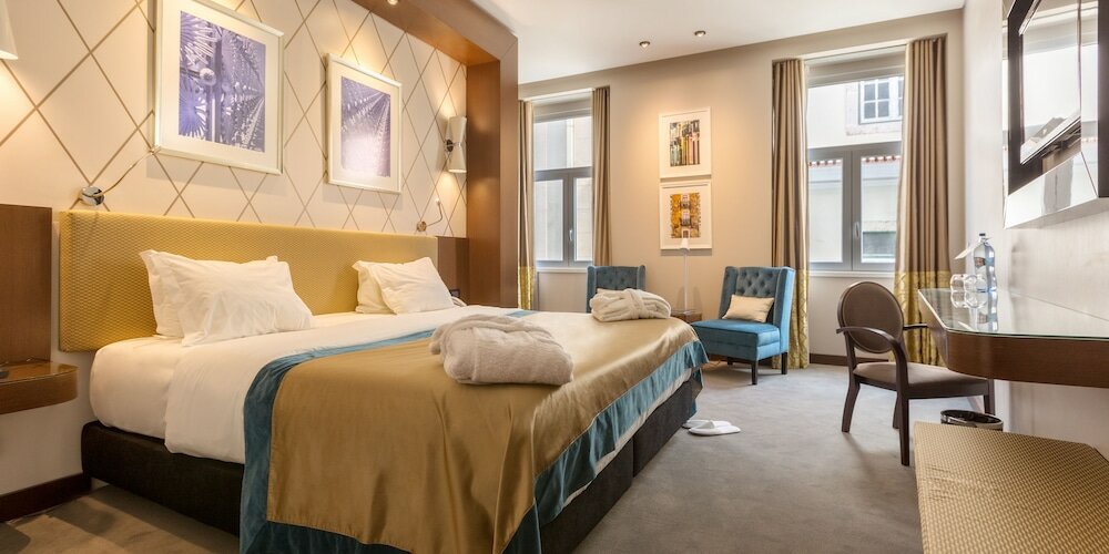 Фото Lisboa Carmo Hotel