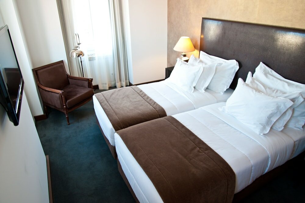 Фото Lisboa Carmo Hotel