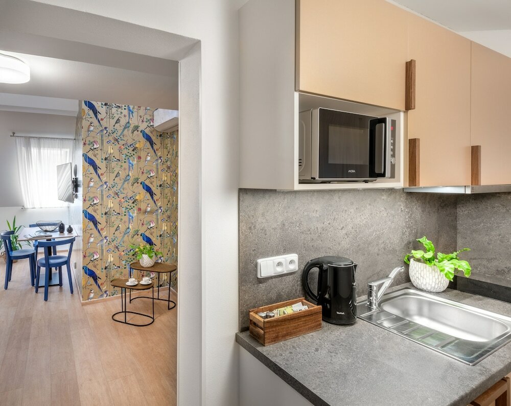 Фото City Nest Apartments by Adrez Living