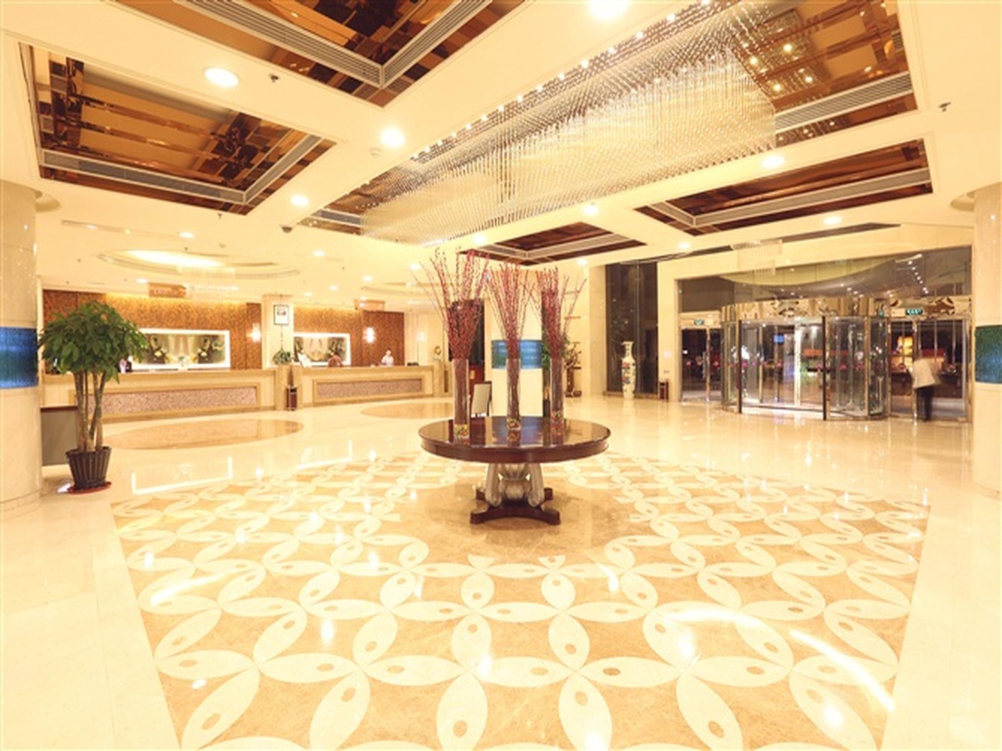 Фото Qingdao Kuaitong International Hotel